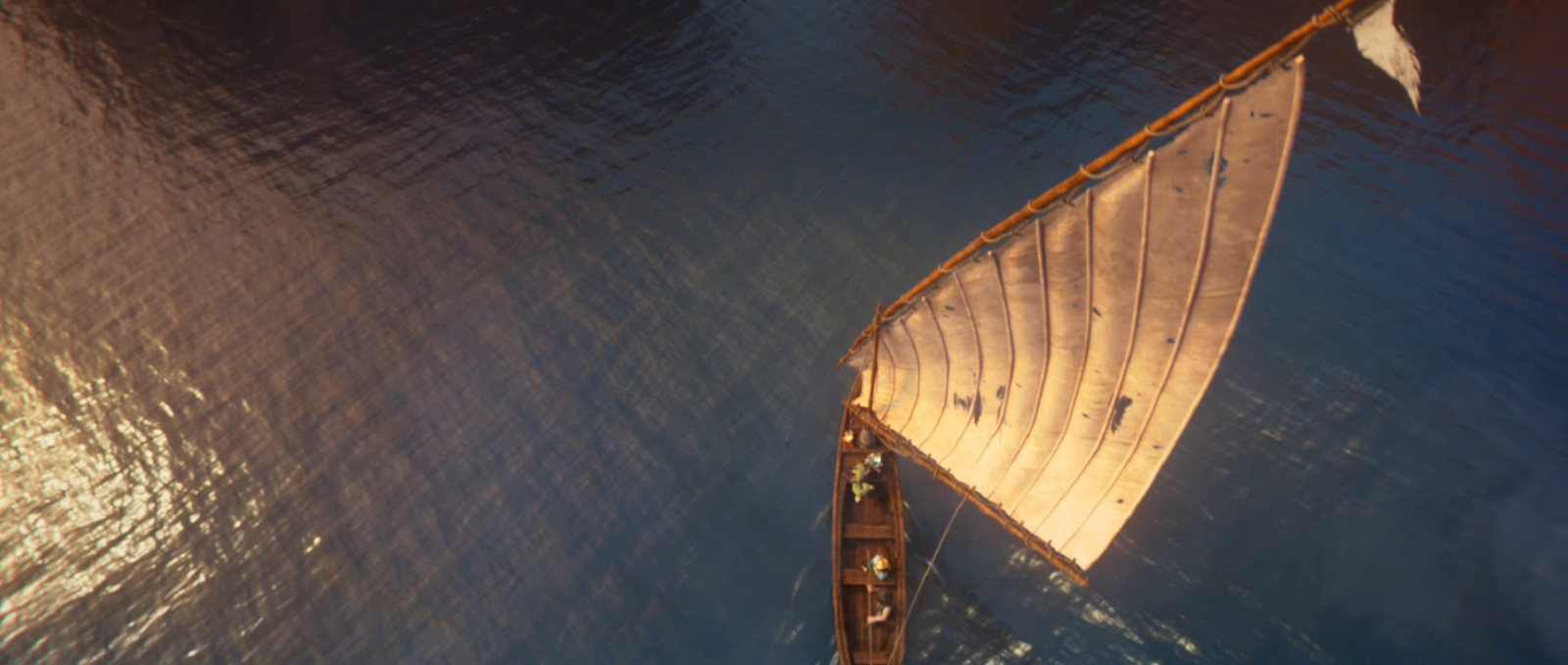 Vista cenital de una barca de vela sobre el mar